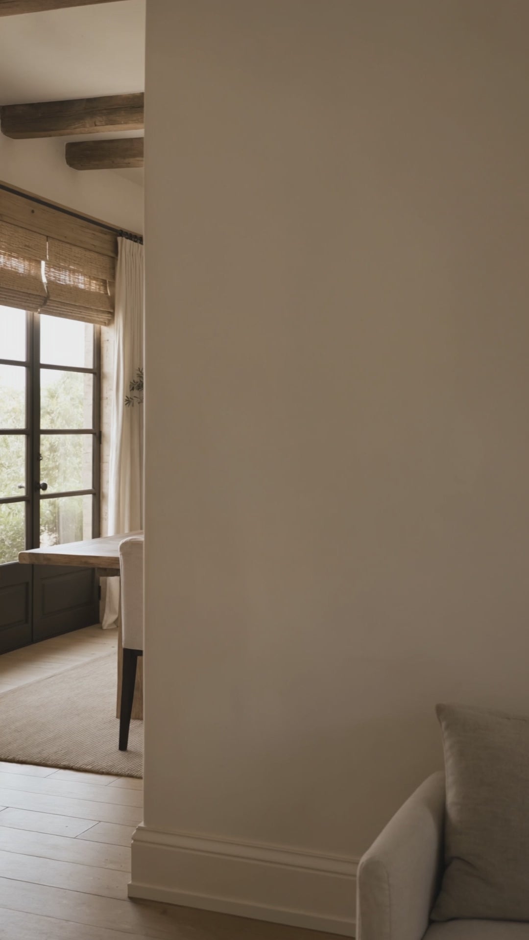 Load video: A video of a dining room featuring a painting of Jesus and a child holding hands.